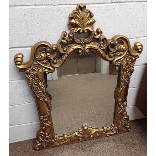 1040 - GILT OVER MANTLE MIRROR WITH FLORAL & LEAF DESIGN TO FRAME, APPROX. 66 X 58 CM