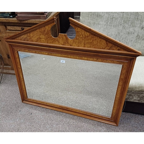 13 - WALNUT FRAMED OVERMANTLE MIRROR LABELLED CHARLES BARR FURNITURE TO BACK.  INNER DIMENSION 55 CM TALL... 