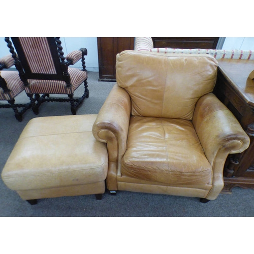 64 - TAN LEATHER ARMCHAIR & LEATHER FOOTSTOOL