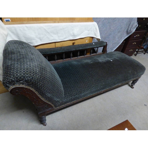 98 - LATE 19TH CENTURY MAHOGANY FRAMED CHAISE LONGUE ON TURNED SUPPORTS.