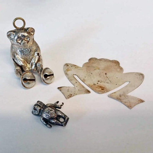 102 - SILVER TEDDY BEAR CHILD'S RATTLE BY WILLIAM VALE & SONS, BIRMINGHAM 1917 & STERLING SILVER FROG BOOK... 