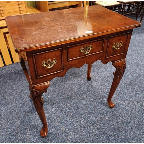 5011 - MAHOGANY LOWBOY WITH 3 DRAWERS ON SHAPED SUPPORTS.  LENGTH 68 CMS