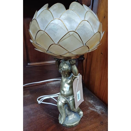 5060 - BRASS TABLE LAMP MODELLED AFTER CHERUB WITH DECORATIVE LOTUS SHADE