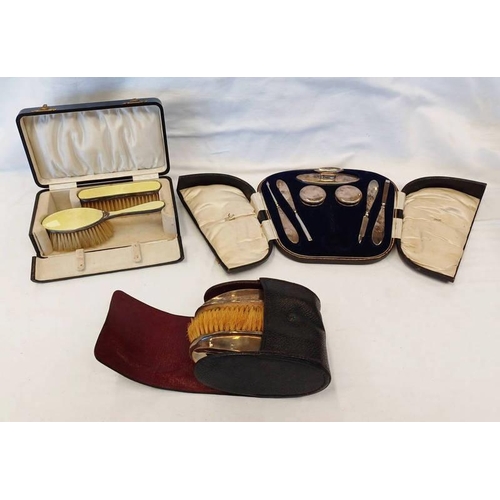 98 - CASED PAIR SILVER & ENAMEL BRUSHES, CASED PAIR SILVER BRUSHES & CASED SILVER MOUNTED MANICURE SET.