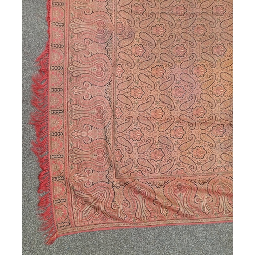 617 - RED AND GOLD PAISLEY SHAWL WITH FRINGED EDGES AND GEOMETRIC DESIGN THROUGHOUT, 188 CM X 173 CM