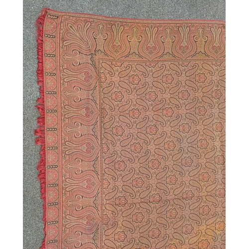 617 - RED AND GOLD PAISLEY SHAWL WITH FRINGED EDGES AND GEOMETRIC DESIGN THROUGHOUT, 188 CM X 173 CM