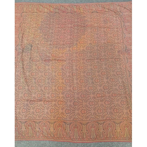 617 - RED AND GOLD PAISLEY SHAWL WITH FRINGED EDGES AND GEOMETRIC DESIGN THROUGHOUT, 188 CM X 173 CM