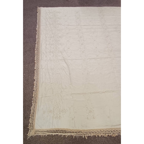 618 - CREAM SEWNWORK SHAWL WITH FLORAL PATTERN THROUGHOUT AND FRINGED EDGES, 250 CM  225 CM