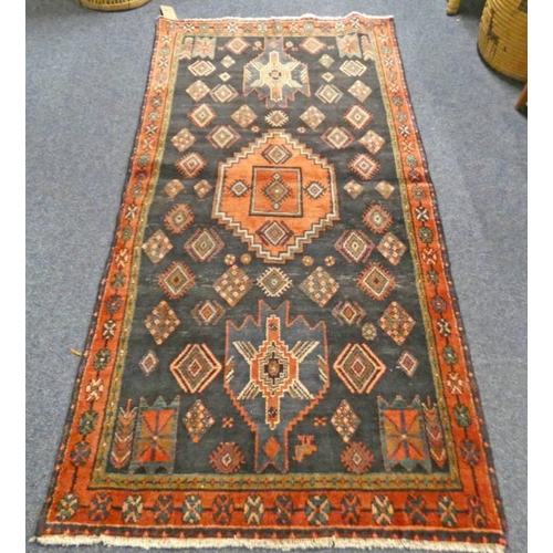 1228 - DEEP GROUND PERSIAN VILLAGE RUG WITH MEDALLION DESIGN - 217 X 112 CM