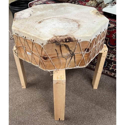 1258 - OCTAGONAL WOOD & ANIMAL SKIN DRUM WITH WOODEN STAND (AF) 76CM ACROSS