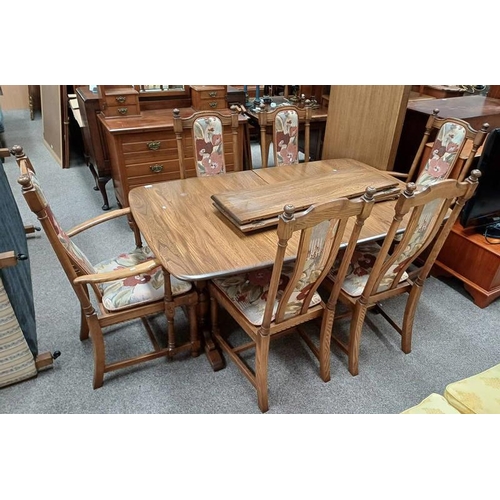 126 - ERCOL ELM EXTENDING DINING TABLE WITH 3 EXTRA LEAVES AND SET OF 6 DINING CHAIRS INCLUDING 2 ARMCHAIR... 