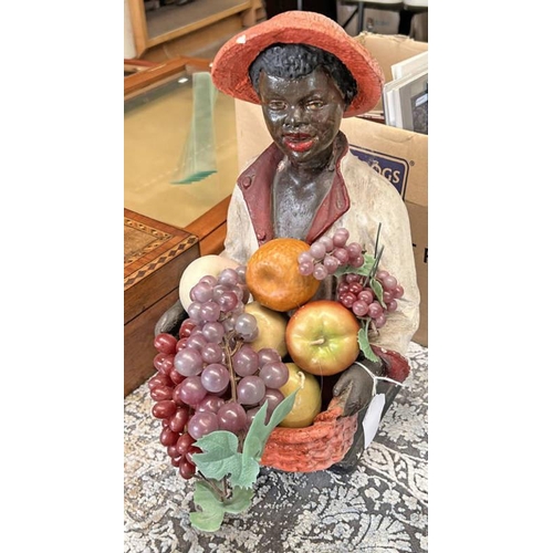 1308 - PLASTER BUST OF GENTLEMAN HOLDING A FRUIT BASKET ALONG WITH FAUX FRUIT, 39CM TALL