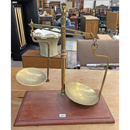 1394 - SET OF LARGE BRASS SCALES ON WOODEN PLINTH