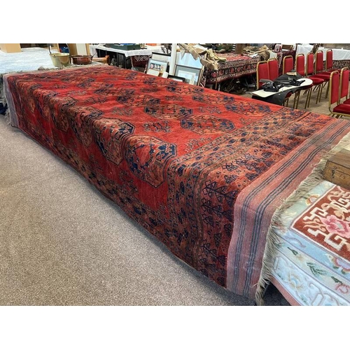 1434 - RED GROUND MIDDLE EASTERN CARPET, 265 X 370 CM