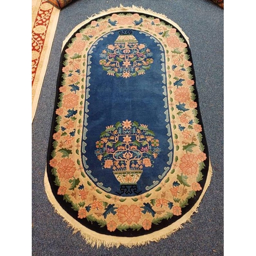 1453 - BLUE FLORAL DECORATED ROUND CARPET, 210 X 120 CM