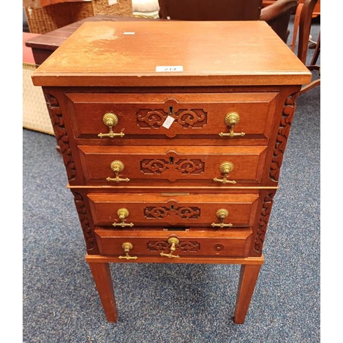 214 - SMALL OAK CHEST WITH CARVED DECORATION & 4 DRAWERS WITH BRASS HANDLES ON SQUARE TAPERED SUPPORTS. 69... 