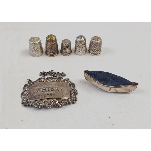 3120 - 3 SILVER THIMBLES, 2 OTHERS, SILVER WINE LABEL & SILVER CANOE PIN CUSHION