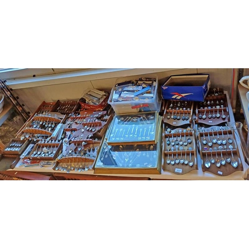 3227 - LARGE SELECTION OF CRESTED SPOONS & VARIOUS WALL RACKS, ETC ON TABLE TOP