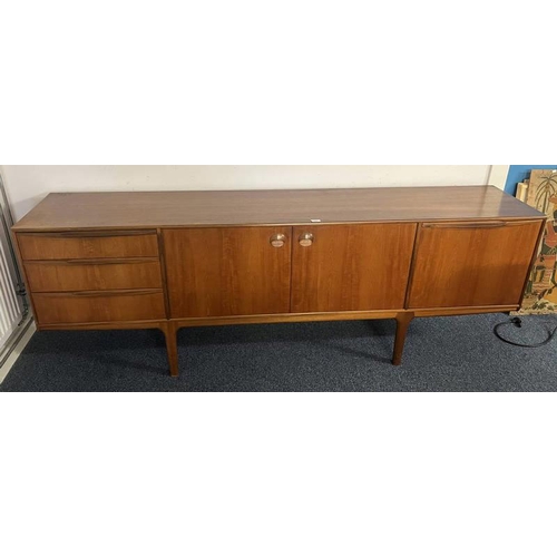 33 - MCINTOSH TEAK SIDEBOARD WITH 3 DRAWERS & 3 PANEL DOORS ON TAPERED SUPPORTS. 75 CM TALL X 213 CM LONG