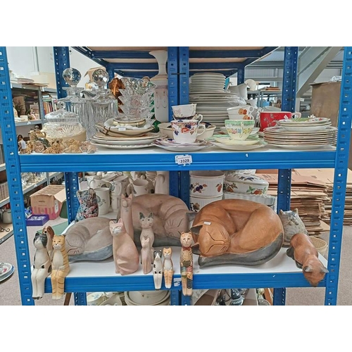 3329 - GOOD SELECTION OF WOODEN CATS, PORCELAIN TEAWARE, CUT GLASS, PORCELAIN DOGS, ETC OVER 2 SHELVES