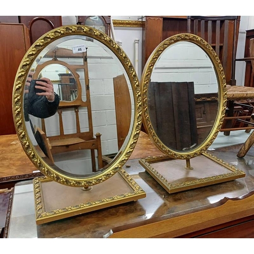 46 - PAIR OF GILT FRAMED OVAL DRESSING TABLE MIRRORS