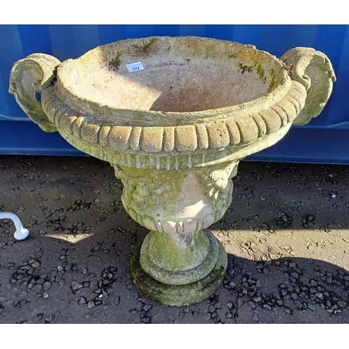 522 - RECONSTITUTED STONE GARDEN URN ON CIRCULAR PLINTH BASE. 56 CM TALL