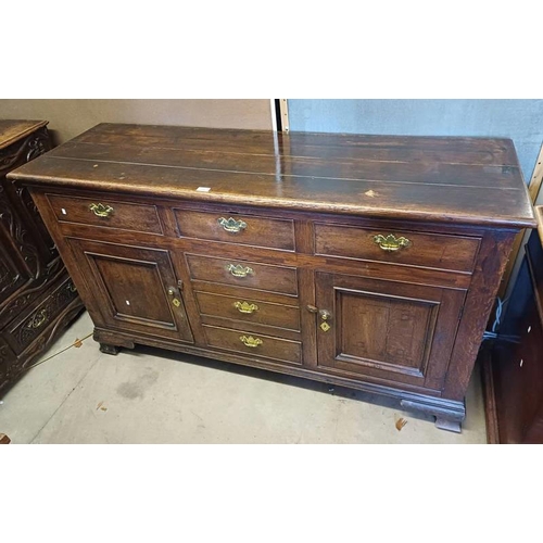 64 - 18TH/19TH CENTURY OAK DRESSER WITH 3 CENTRALLY SET DRAWERS FLANKED BY 2 PANEL DOORS WITH 3 DRAWERS A... 