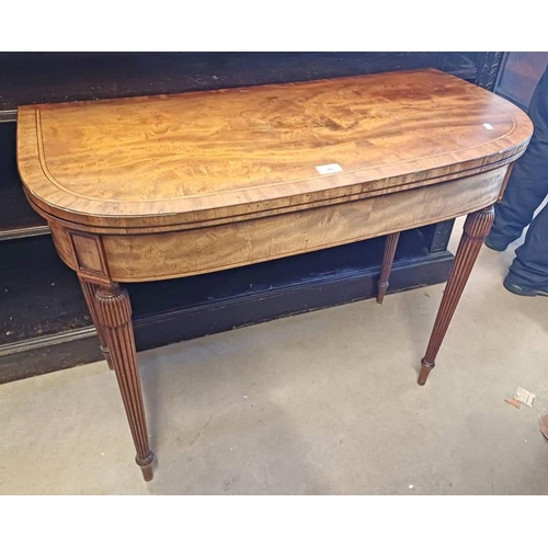 76 - 19TH CENTURY INLAID MAHOGANY CARD TABLE WITH FLIP - UP TOP ON REEDED SUPPORTS.  74 CM TALL X 92 CM W... 