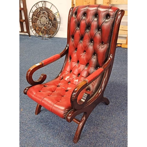 79 - MAHOGANY X - FRAMED SCROLL ARM BUTTONED BACK RED LEATHER ARMCHAIR