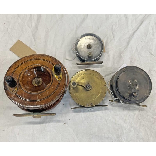 1028 - 2 3/4'' H MOORE LIVERPOOL REEL, 3 1/4'' BRASS SIDE CRANK REEL, 4 1/2'' WOOD & BRASS REEL & A 2  1/4'... 