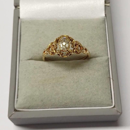 386 - LATE 19TH CENTURY GOLD DIAMOND SET RING, THE OVAL DIAMOND APPROX 0.44 CARATS IN PIERCED WORK SETTING... 