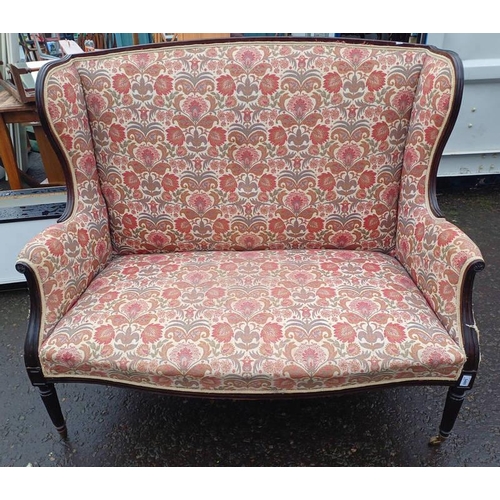 5480 - 19TH CENTURY MAHOGANY FRAMED WINGBACK SETTEE ON REEDED SUPPORTS