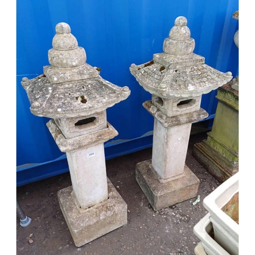 5506 - PAIR OF RECONSTITUTED STONE ORIENTAL TOWER GARDEN ORNAMENTS ON SQUARE PLINTH BASES.  APPROX 100 CM T... 