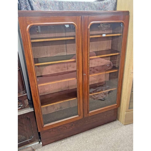 107 - 19TH CENTURY MAHOGANY BOOKCASE WITH 2 GLAZED PANEL DOORS OPENING TO SHELVED INTERIOR ON PLINTH BASE,... 