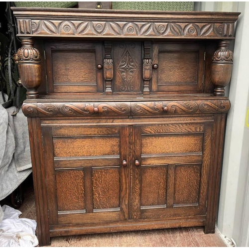 123 - 19TH CENTURY STYLE CARVED OAK COURT CUPBOARD WITH 2 SMALL PANEL DOORS OVER 2 DRAWERS & 2 PANEL DOORS... 