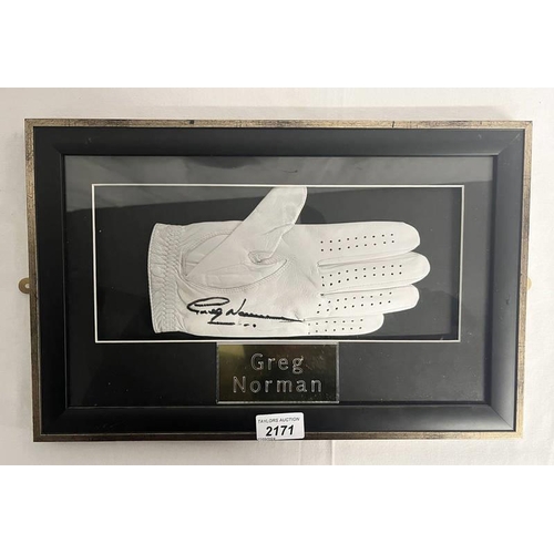 2171 - GREG NORMAN FRAMED SIGNED GOLF GLOVE