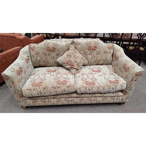 312 - OVERSTUFFED 2 SEATER SETTEE WITH BEIGE FLORAL PATTERN