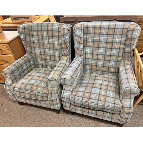 314 - PAIR OF OVERSTUFFED WINGBACK ARMCHAIRS WITH PLAID UPHOLSTERY ON TURNED SUPPORTS.