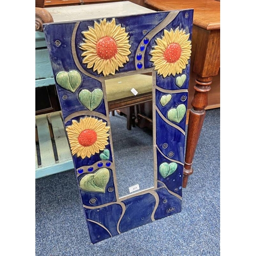 321 - RECTANGULAR MIRROR WITH PAINTED TILE INSET FRAME DECORATED WITH SUNFLOWERS SIGNED 'MA', INNER DIMENS... 