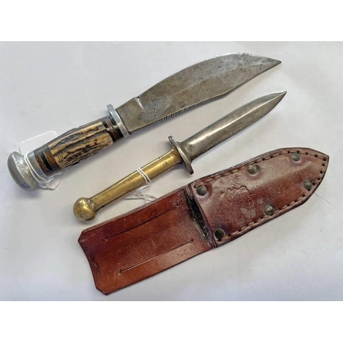 1298 - INTERESTING DOUBLE EDGED DAGGER WITH SOLID BRASS HILT WITH A LEATHER SCABBARD AND A STAG HORN HILTED... 