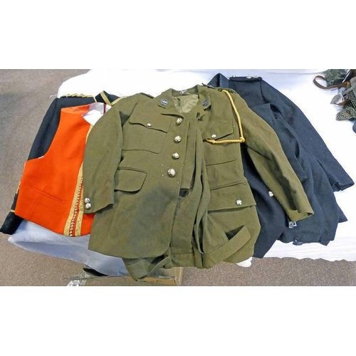 1593 - UNIFORMS OF A LIEUTENANT/CAPTAIN IN THE ROYAL TANK REGIMENT, MESS KIT COMPRISING OF A SIDE FASTENING... 