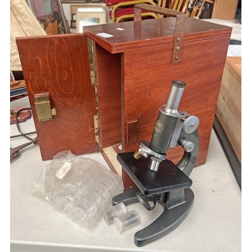 1631 - C BAKER LONDON MICROSCOPE WITH ACCESSORIES IN A FITTED WOODEN CASE