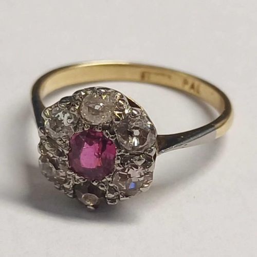166 - 18CT GOLD RUBY & DIAMOND CLUSTER RING, THE OVAL SHAPED RUBY SET WITHIN A SURROUND OF 6 CUSHION SHAPE... 