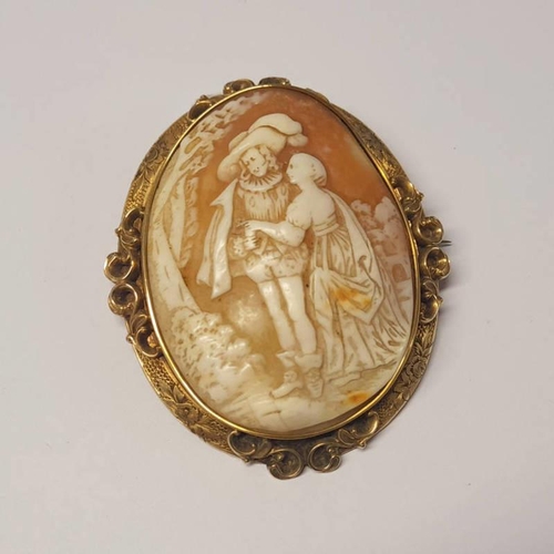 179 - VICTORIAN GOLD SHELL CAMEO BROOCH OF A COUPLE IN A DECORATIVE MOUNT - 7CM LONG, 31G