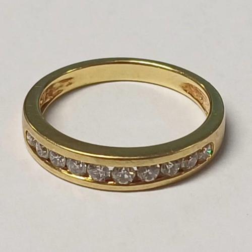 215 - 18CT GOLD DIAMOND SET HALF HOOP ETERNITY RING, APPROX. 0.3 CARATS IN TOTAL - 3.0G, RING SIZE J