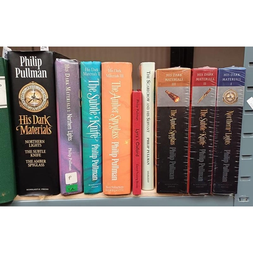 2159 - SELECTION OF PHILLIP PULLMAN TITLES TO INCLUDE; HIS DARK MATERIALS, NORTHERN LIGHTS, SIGNED CARD LOO... 