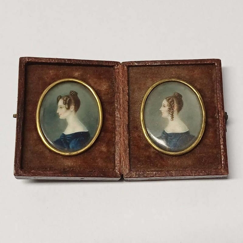 43 - PAIR OF 19TH CENTURY PORTRAIT MINIATURES OF SISTERS - POSSIBLY TWINS DRESS IN BLUE DRESSES IN A FITT... 