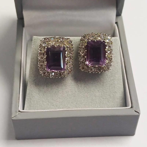 47 - PAIR OF AMETHYST & DIAMOND CLUSTER EARSTUDS, THE RECTANGULAR CUT AMETHYSTS SET WITHIN A SURROUND OF ... 