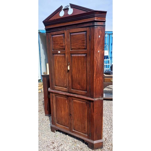 5133 - 19TH CENTURY MAHOGANY CORNER CABINET WITH BRASS EAGLE FINIAL & 2 PANEL DOORS OVER 2 PANEL DOORS