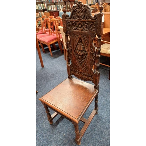 5151 - 19TH CENTURY OAK HALL CHAIR WITH CARVED DECORATION